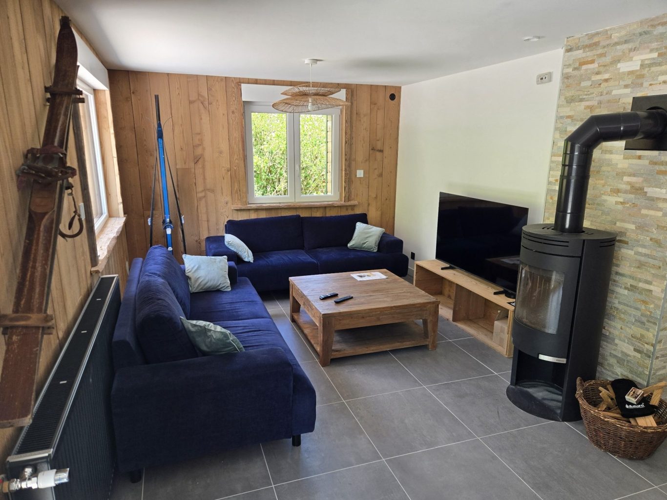 Grande pièce à vivre Chalets des Privilèges - Location saisonnière haut de gamme à Gérardmer