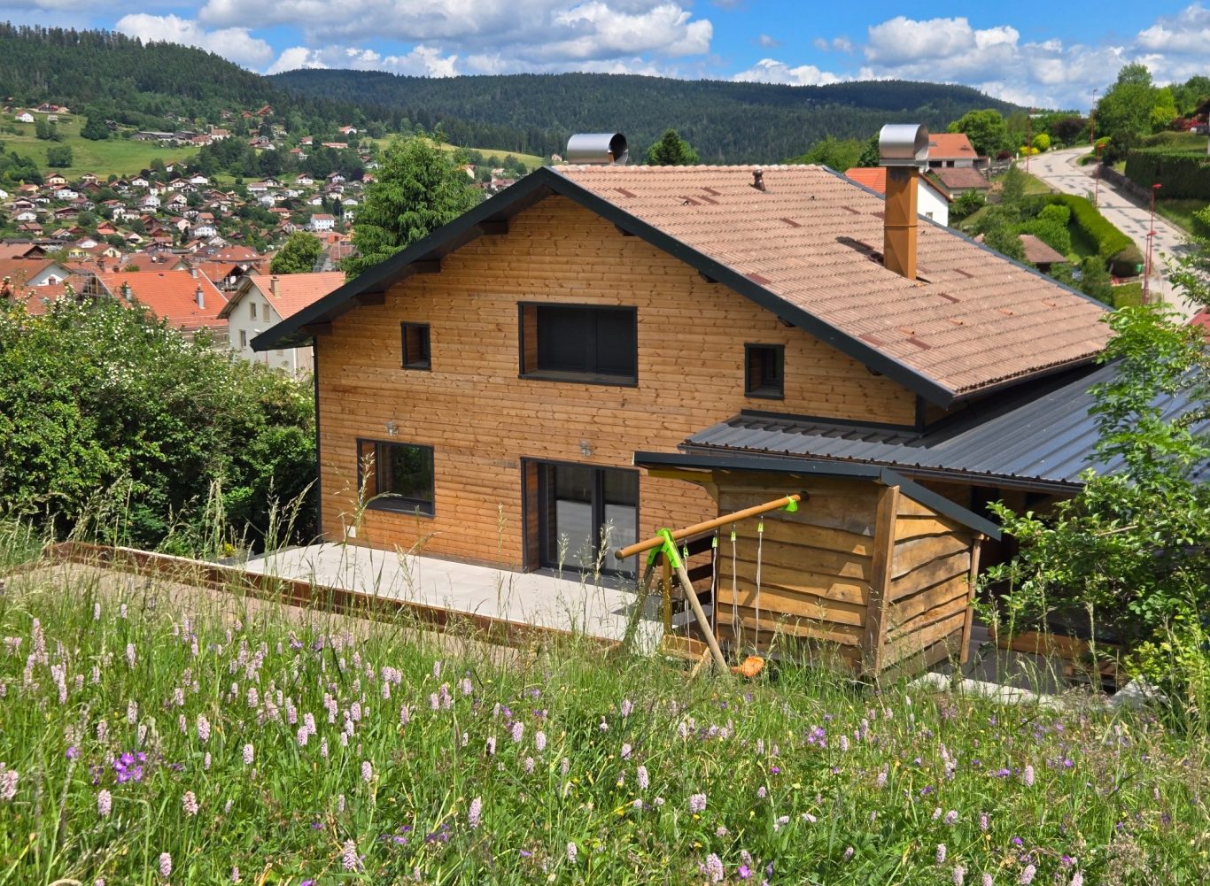 Chalet entrée Chalets des Privilèges - Location saisonnière haut de gamme à Gérardmer